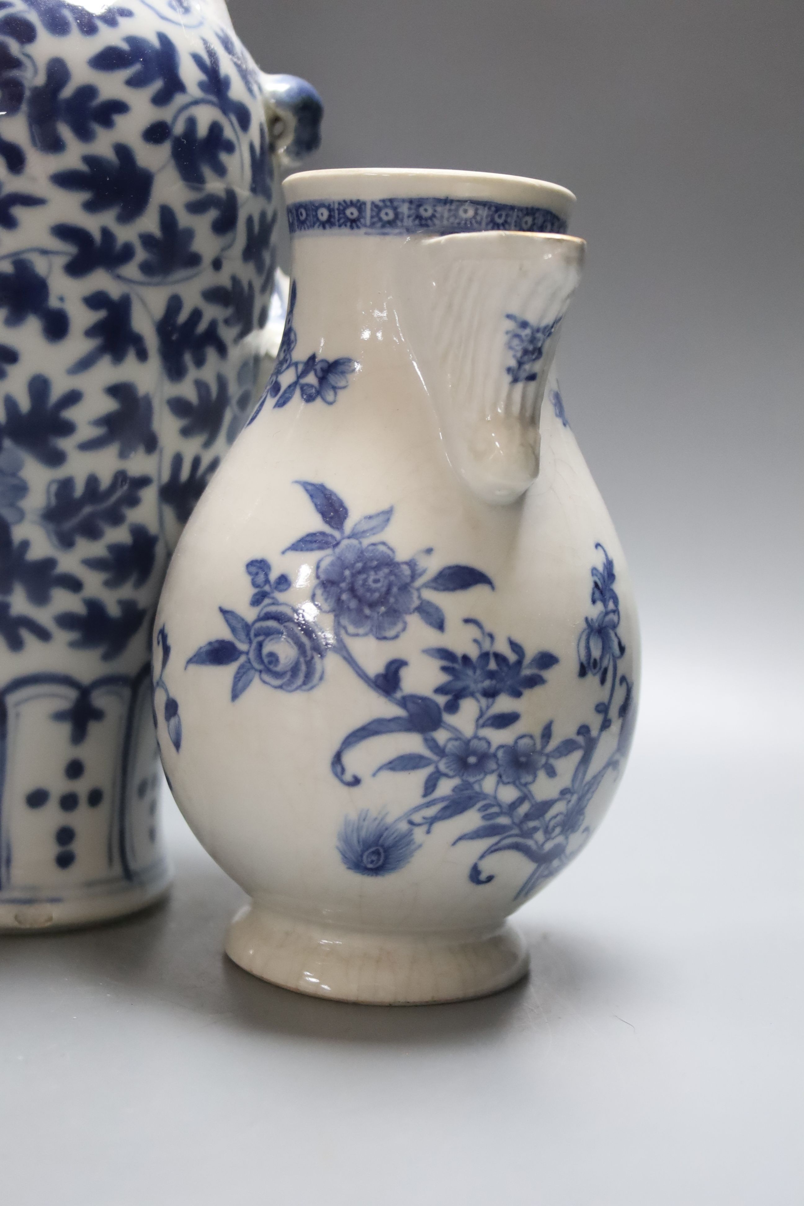 Two 19th century Chinese blue and white vases, an 18th Century blue and white jug and a later jar and cover, tallest 30cm